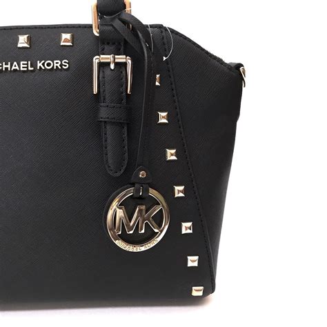 michael kors reese messenger bag|Michael Kors studded crossbody bag.